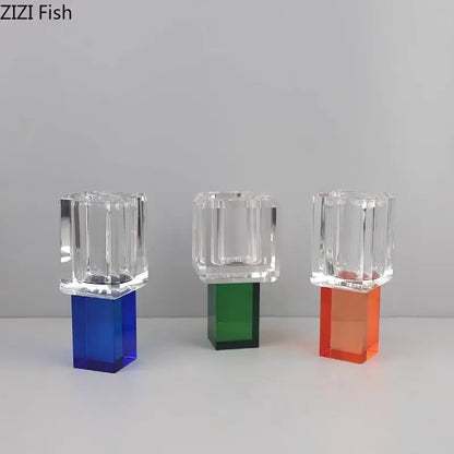 Three translucent crystal candle holders with geometric square acrylic bases in blue orange for decorbites artificial flowers decor