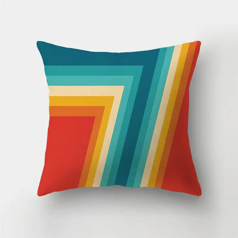 Modern geometric stripe patchwork pillow case set with bold teal orange yellow and cream stripes on red background