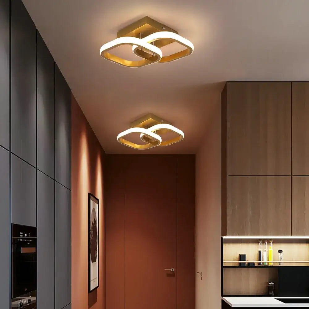 Modern geometric ceiling lamp with gold-finished acrylic led intertwined ring design for bedroom decorbites acrylic led ceiling
