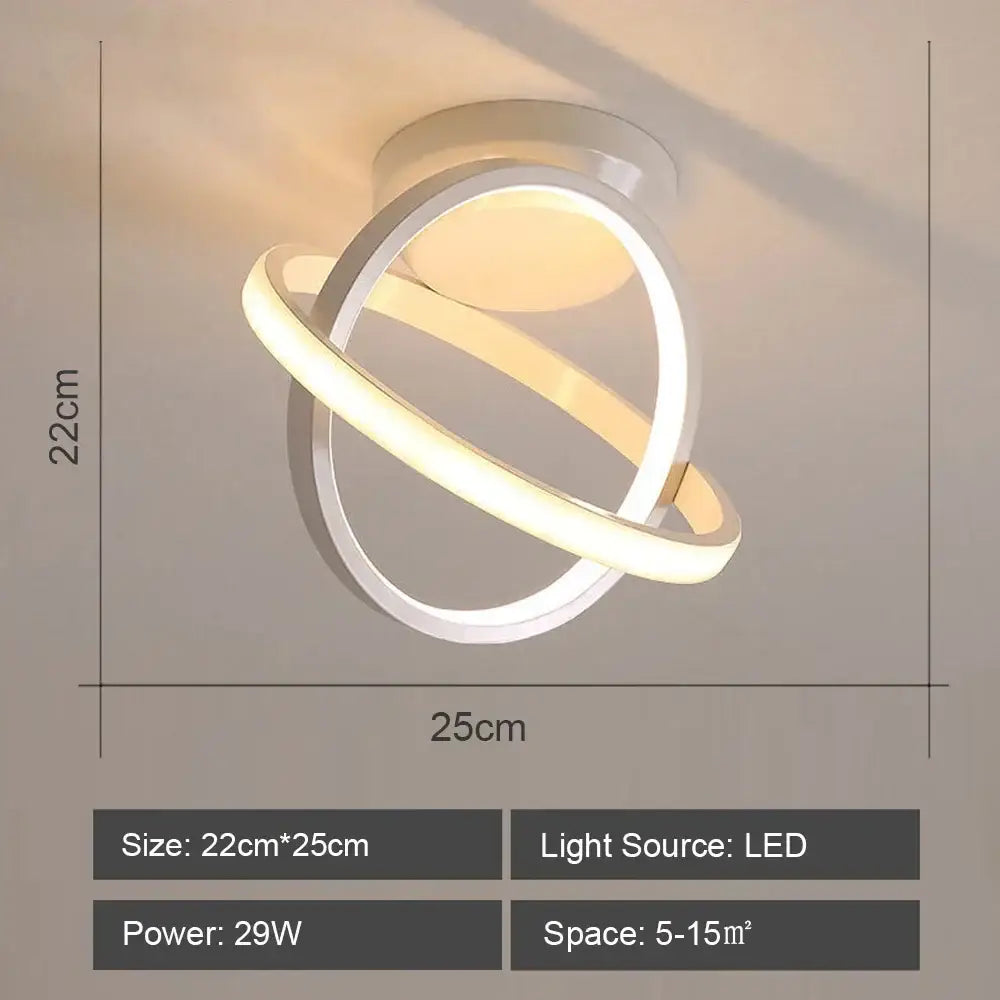 Modern geometric white led ceiling light with two intersecting rings emitting warm glow for living room decorbites led ceiling