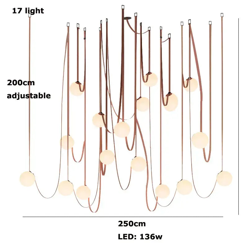 Modern black and orange glass ball led pendant light with 17 frosted glass lights and copper-toned cords by decorbites