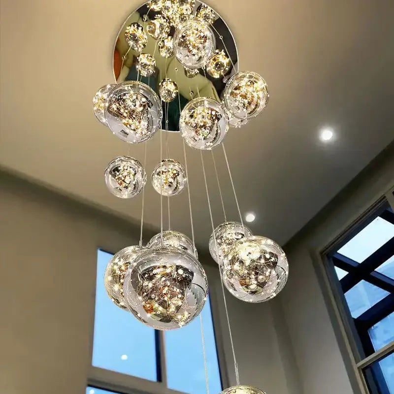Modern glass ball spiral chandelier with transparent spherical glass orbs and led lighting for dining room decorbites