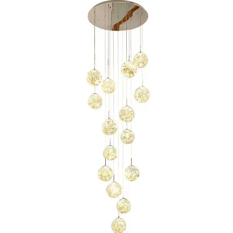 Modern chrome-finished decorbites glass ball spiral chandelier with cascading globes and warm golden glow for dining room