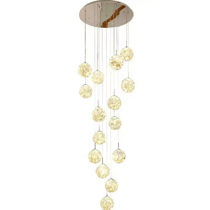 Modern chrome-finished decorbites glass ball spiral chandelier with cascading globes and warm golden glow for dining room