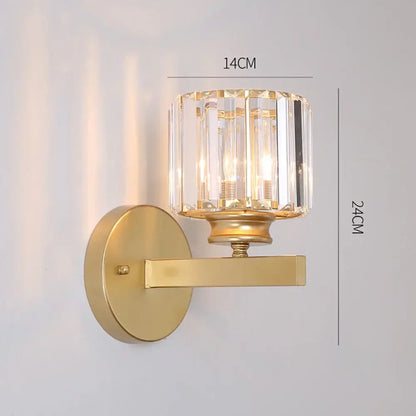 Gold-toned modern glass ball wall lamp with cylindrical crystal shade and vertical faceted glass panels for bedroom decorbites glass ball