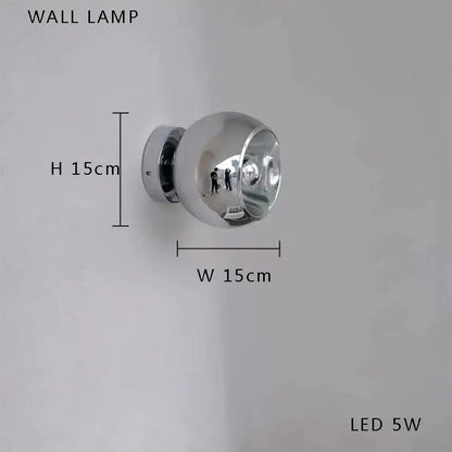 A sleek spherical chrome wall lamp with a reflective surface and led 5w bulb for decorbites glass bubble ceiling chandelier