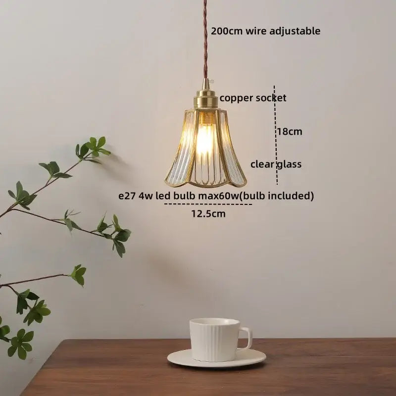 Modern glass copper pendant light with brass frame, clear glass shade, and e27 led bulb for dining room use