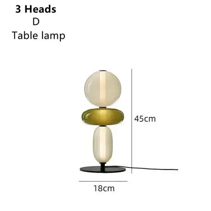 Modern glass floor lamp set of 3 with three-headed floor lamp led featuring stacked cream and olive glass orbs on black base