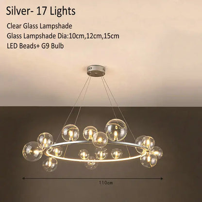 Silver modern glass chandelier lamp with 17 clear glass globes suspended from circular frame for kitchen island lighting