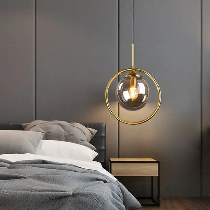 Modern Glass Globe Pendant Light With Gold Ring - Decorbites