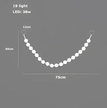 Modern glass gold pendant light featuring a sleek curved string of 19 white LED lights for elegant living room decorbites glass gold pendant