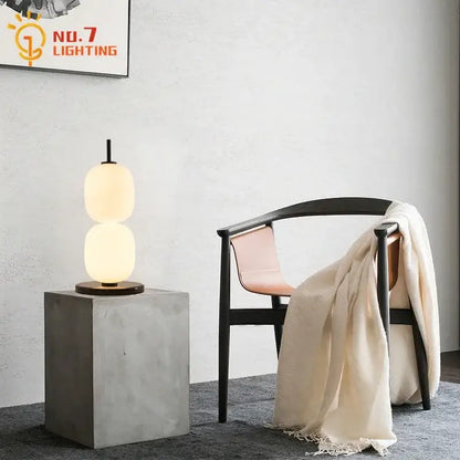 Modern glass gourd table lamp with warm glow white glass shades and dark metal base for bedroom decorbites table lamp