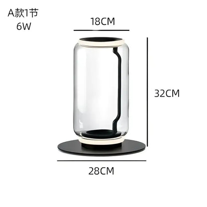 Modern glass led floor lamp with a sleek transparent glass vase featuring a black base and curved handle for living room use