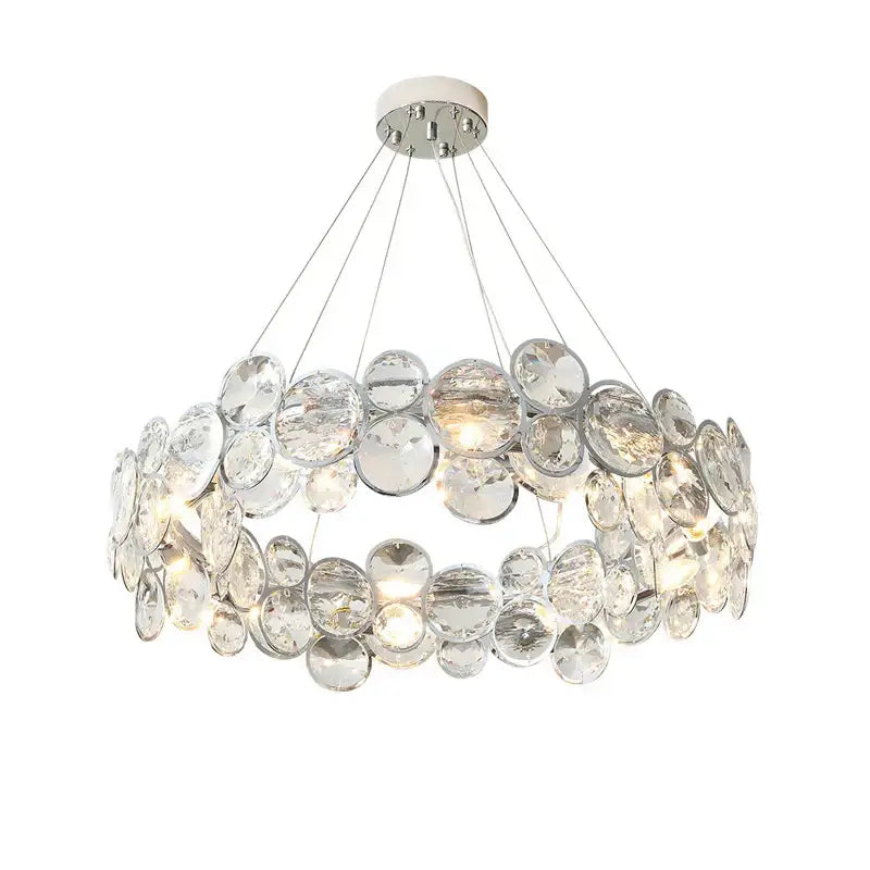 A modern pendant light with clear faceted crystal discs in a chrome mount from decorbites crystal magic ring collection