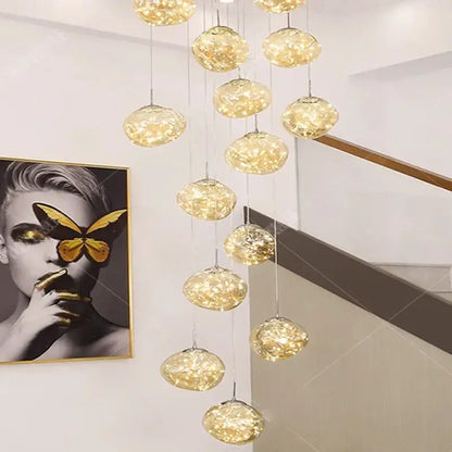 Modern glass orb pendant light with textured golden glass finish and warm led illumination using led bulbs for living room
