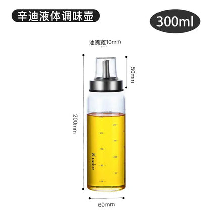 Modern glass seasoning storage bottle of 300ml with transparent glass body and silver metal pump for kitchen organization