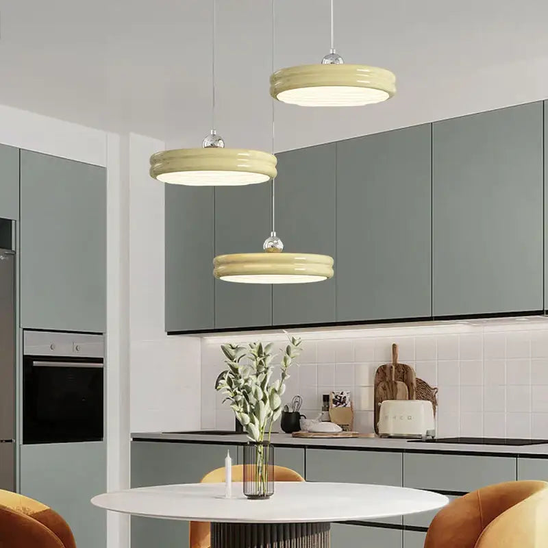 Modern glossy pale yellow circular dimmable pendant light from decorbites suitable for dining room decor