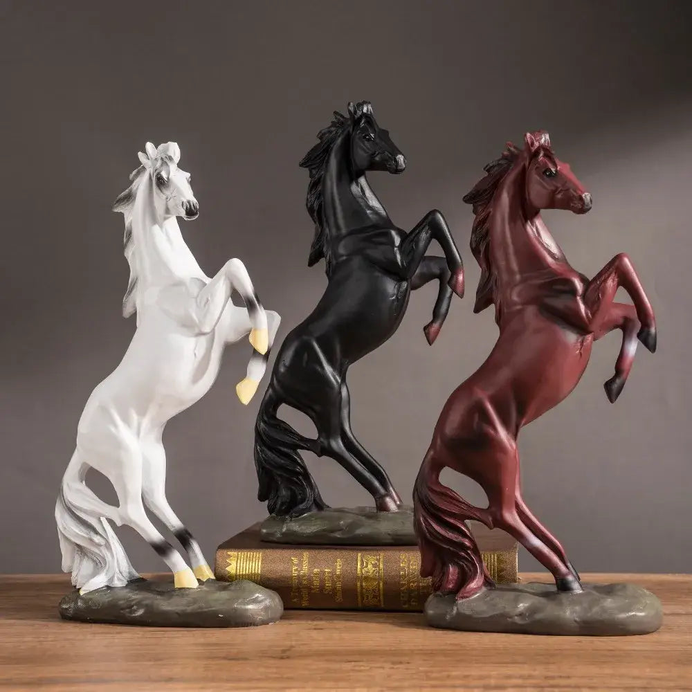 Three glossy resin horse statues in white black and maroon rearing on rocky bases decorbites horse statue for living room decor
