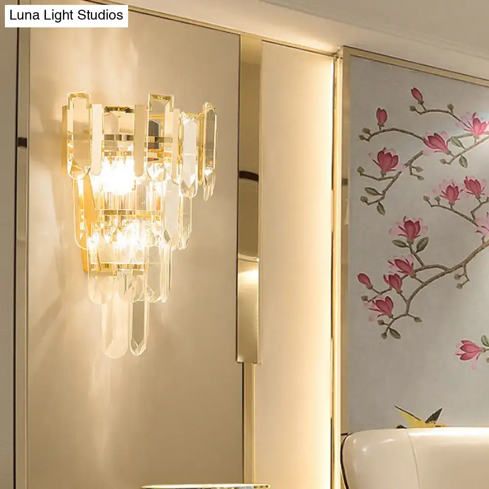 Modern gold 3-headed crystal wall sconce with clear acrylic and metal elements warm glow 15 inch fixture for bedroom