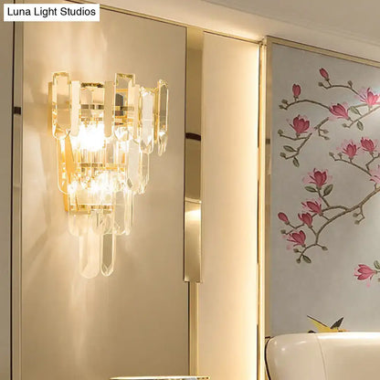 Modern gold 3-headed crystal wall sconce with clear acrylic and metal elements warm glow 15 inch fixture for bedroom