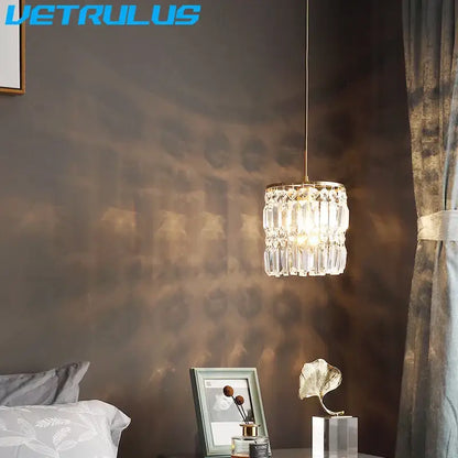 Modern gold 3 tier chandelier pendant light with cylindrical crystal design and gold metal frame for dining room use