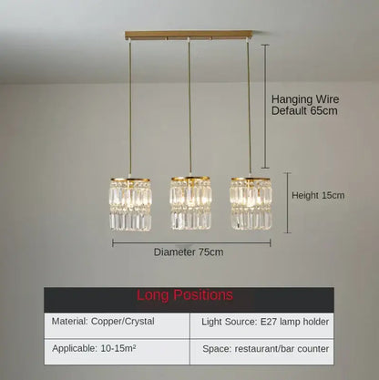 Modern gold 3 tier chandelier pendant light with gold toned copper and clear faceted crystal tiers for dining room