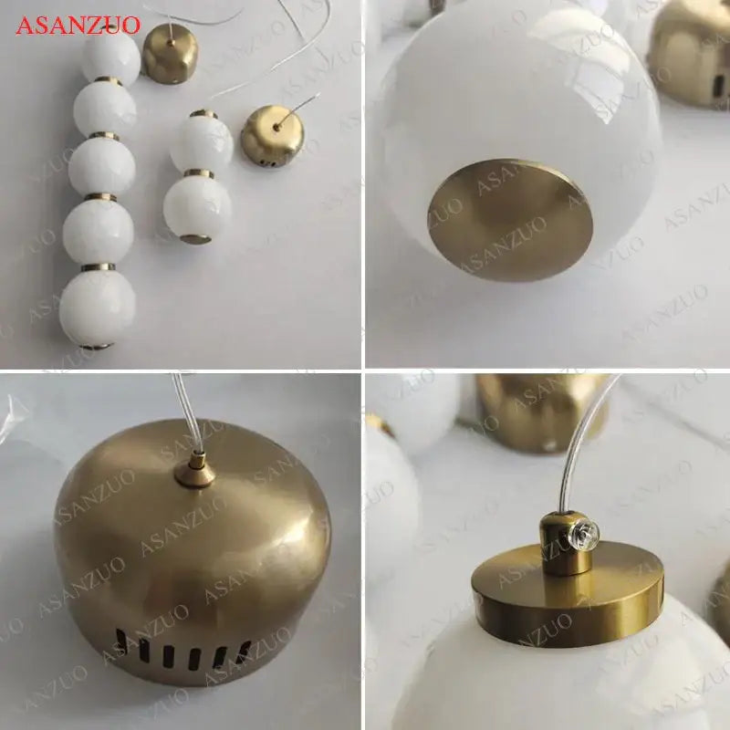 Modern gold 5-sphere glass ball pendant lights featuring white opaline glass globe and brass hardware for decorbites glass ball decor