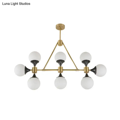 Modern gold metal chandelier with six frosted glass globe shades for island lighting and led incandescent use