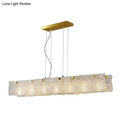 Gold-toned decorbites modern 9-light island pendant with transparent crackle glass and brass accents for 110v-120v use