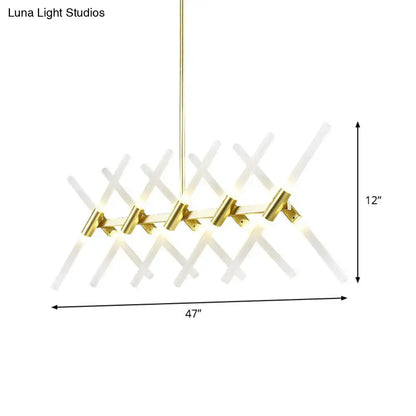 Modern gold DecorBites™ 20-head tubular acrylic island light with white rods and brass accents for contemporary spaces
