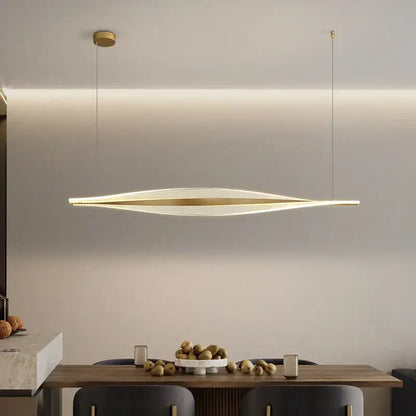 Modern gold acrylic led pendant lamp with linear design and warm ambient glow for dining room decorbites acrylic led