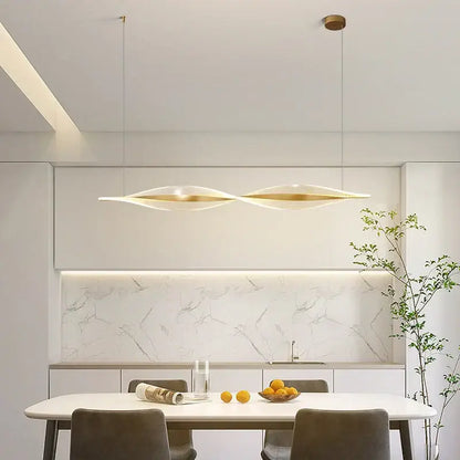 Modern gold acrylic led pendant lamp with sleek dual-winged design in brushed gold and white for dining room decorbites acrylic led