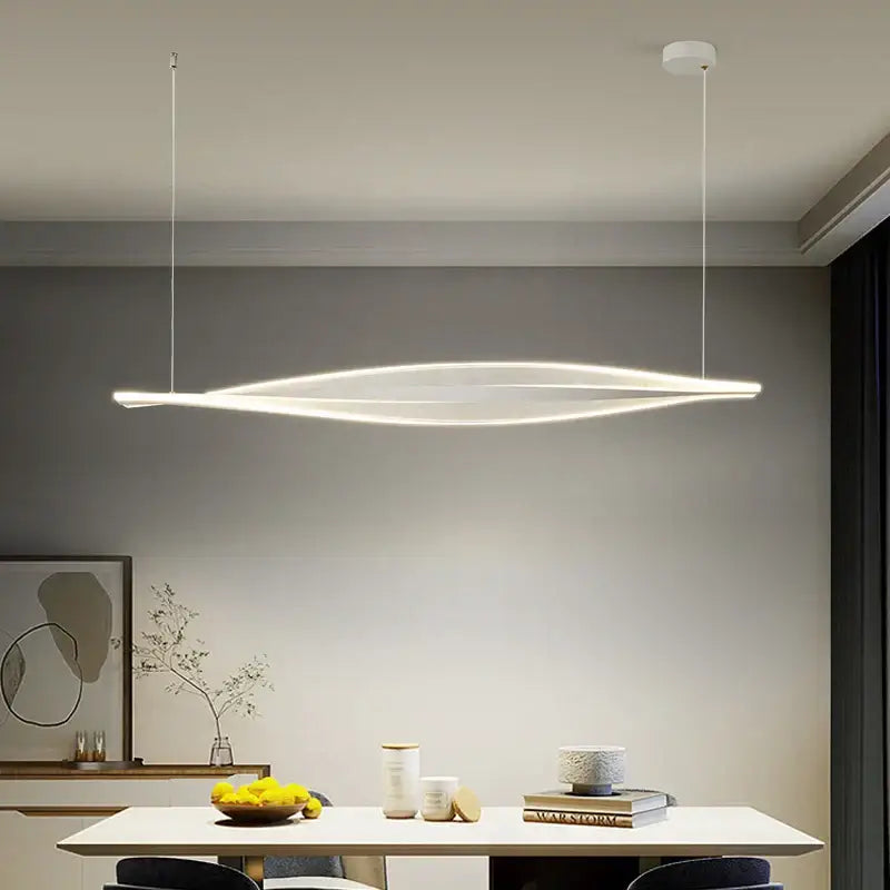 Modern gold acrylic led pendant lamp with sleek elongated oval white design suspended by thin cords for dining room decorbites acrylic led
