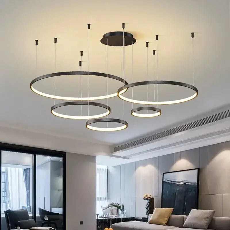 Modern black circular pendant light with illuminated acrylic led ring suitable for dining room decorbites acrylic led design