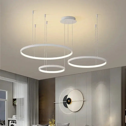 Modern white circular pendant light with sleek minimalist design featuring decorbites acrylic led ring for dining room