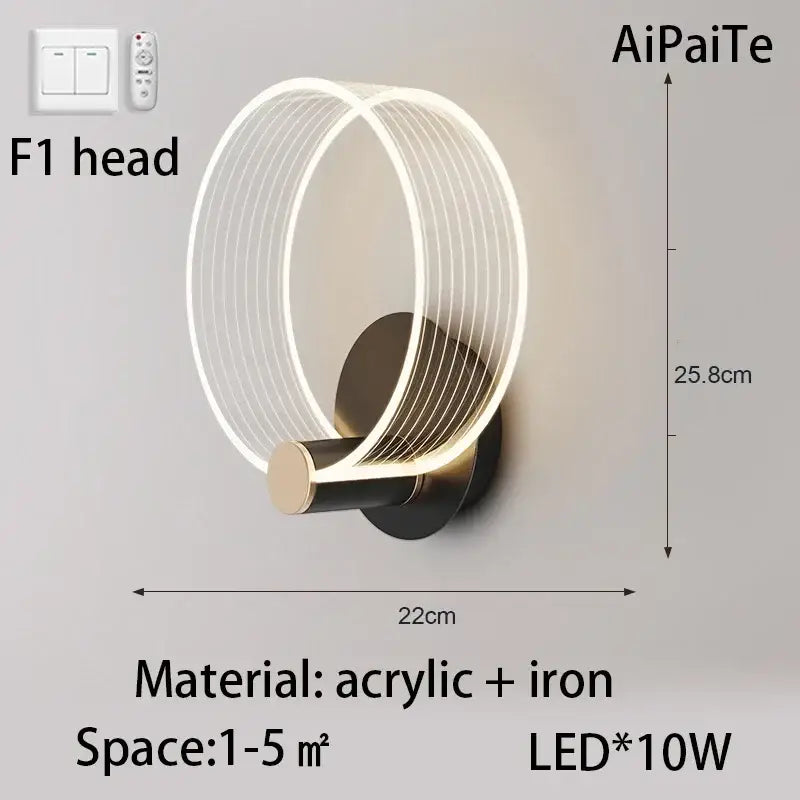 Modern gold acrylic lustre chandelier featuring a circular led wall sconce with warm glowing rings by decorbites acrylic lustre