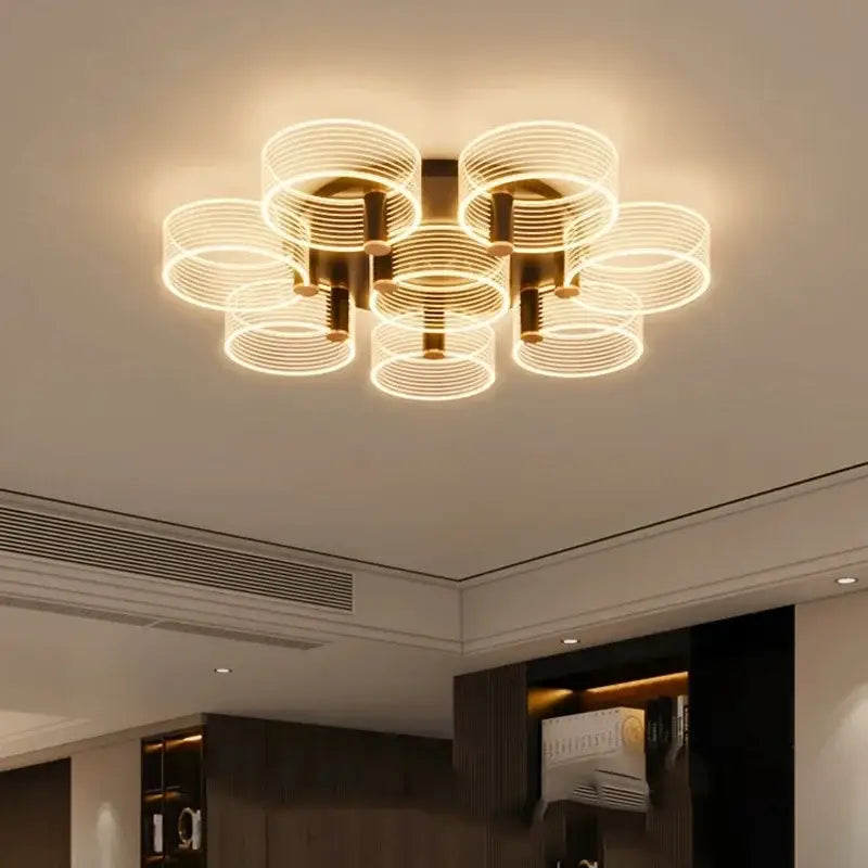 Modern gold acrylic lustre chandelier with multiple warm glowing concentric rings for stylish living room decorbites acrylic lustre