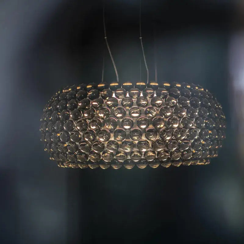 Modern gold acrylic rs7 bulb pendant lights featuring a spherical design of clear glass orbs for dining room decorbites