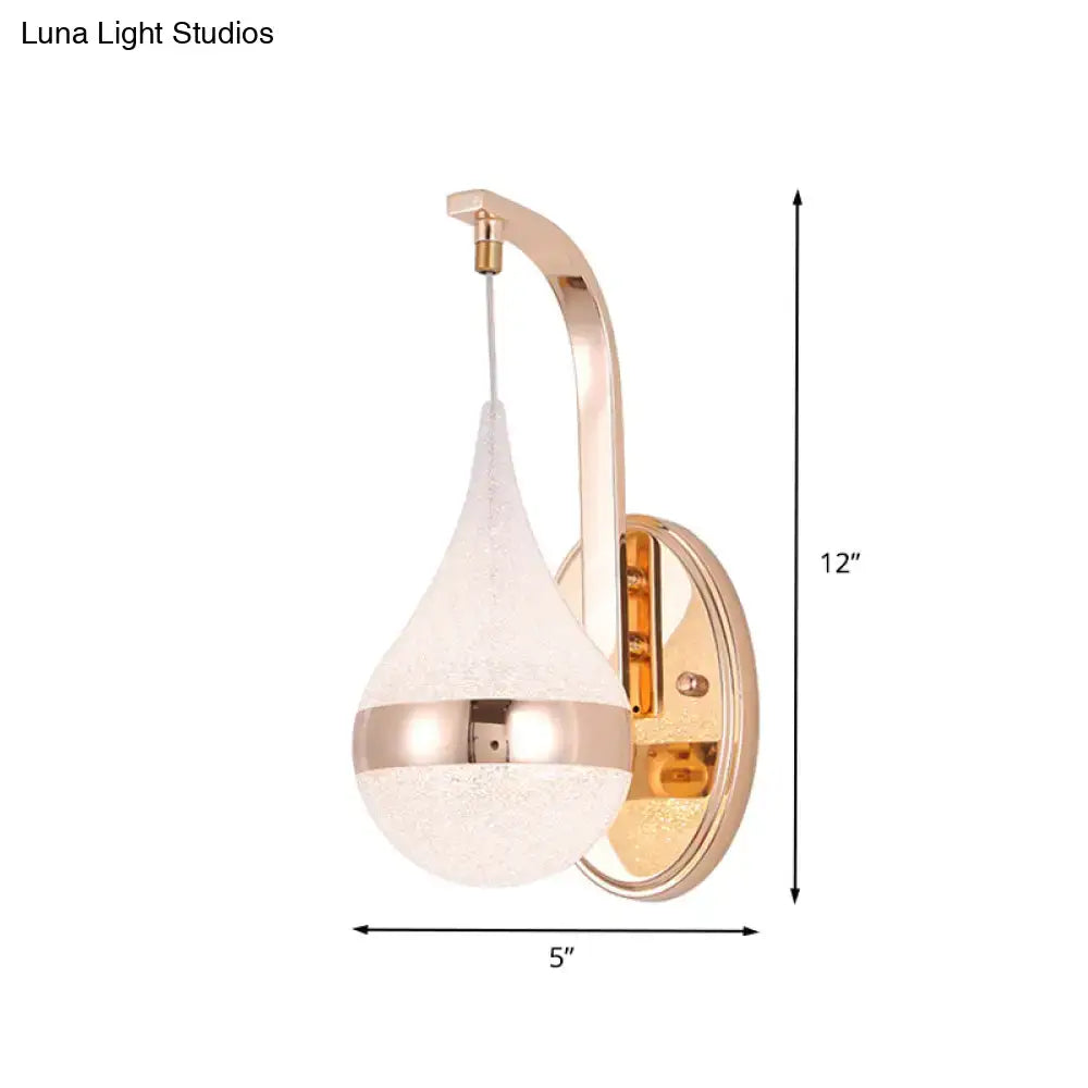 Modern gold acrylic waterdrop wall light fixture with rose gold tone textured frosted glass shade and metallic band