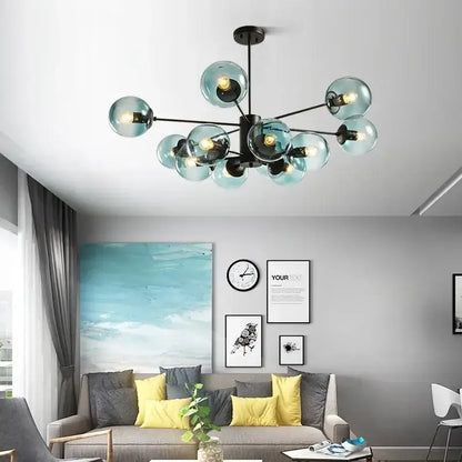 Modern chandelier with multiple translucent teal glass globes and black metal arms for decorbites adjustable ball glass lustre