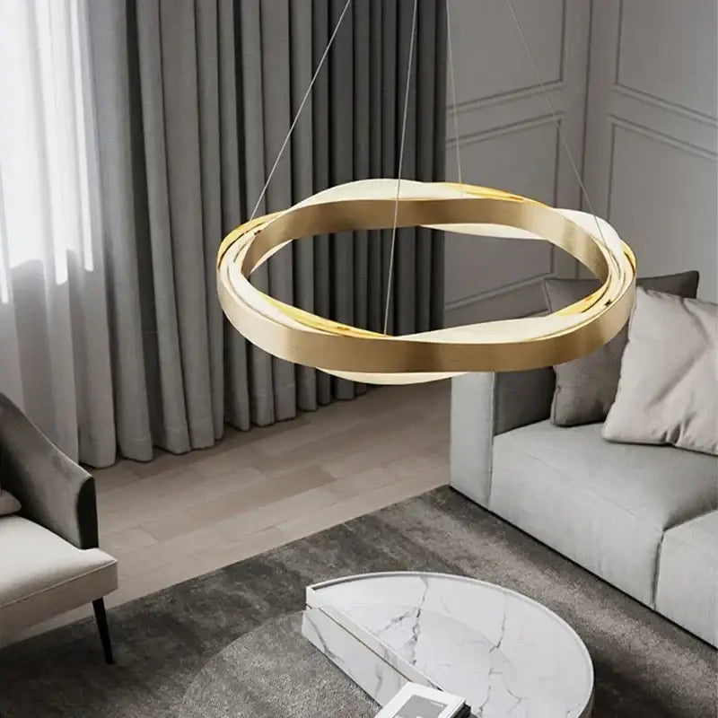 Modern gold and black circle chandelier pendant light with sleek intertwined rings ideal for dining room decorbites black circle