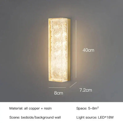 Modern gold and black led bedroom wall lamp featuring a rectangular wall lamp with polished copper frame and resin center decorbites led bedroom