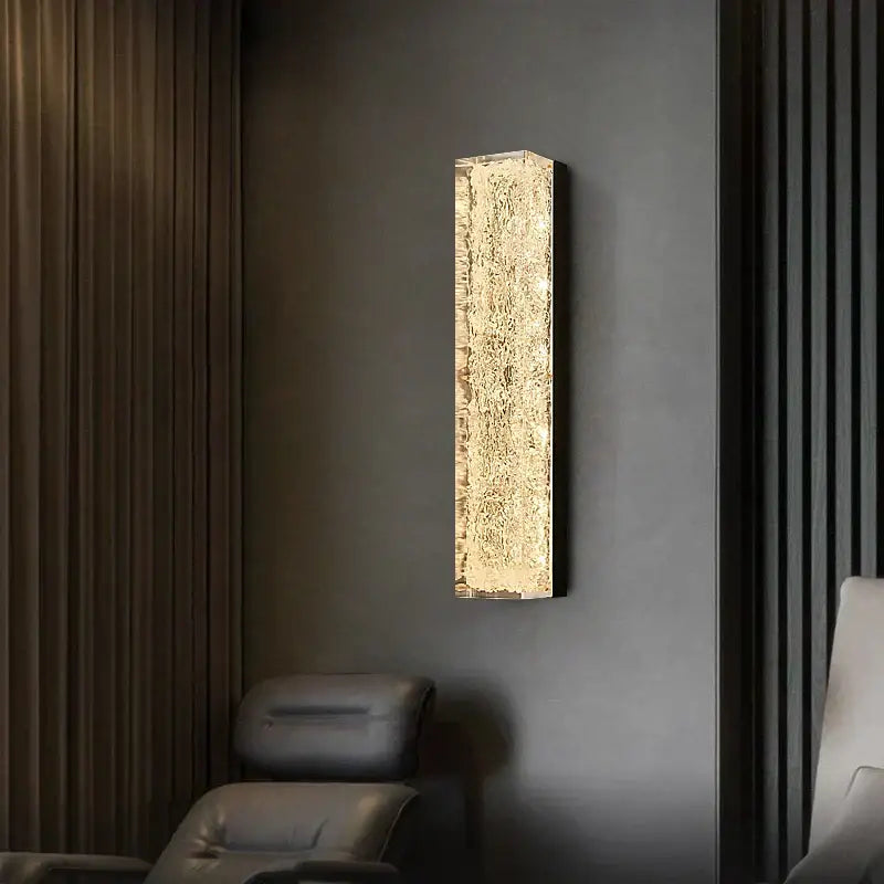 Modern gold and black led bedroom wall lamp with textured golden glass face and sleek black frame for wall decorbites led bedroom
