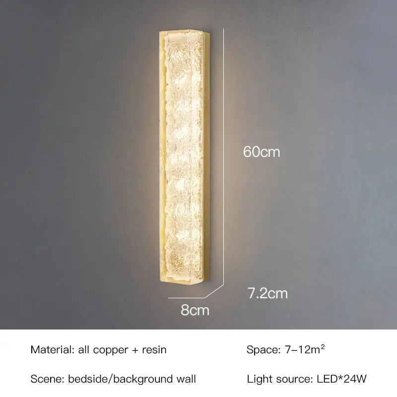 A sleek 60cm modern gold and black wall lamp with textured resin body and polished copper frame for decorbites led bedroom