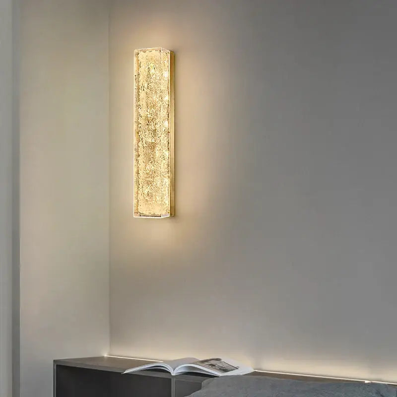 Modern gold and black led bedroom wall lamp with textured golden glass and metallic frame for decorbites led bedroom wall use
