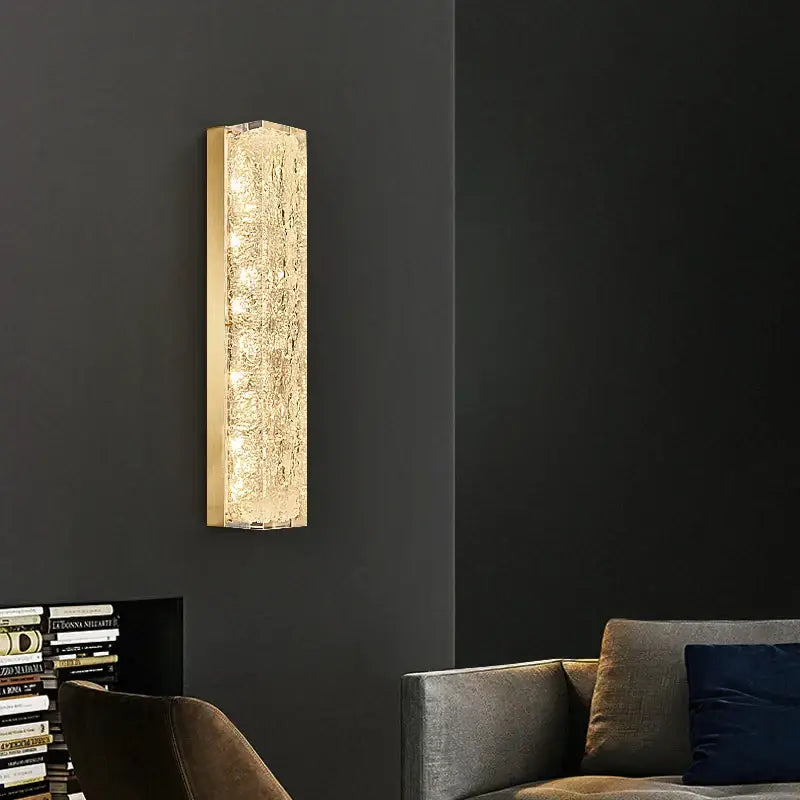 Modern gold and black led bedroom wall lamp with gold-toned rectangular wall lamp and textured translucent glass panel