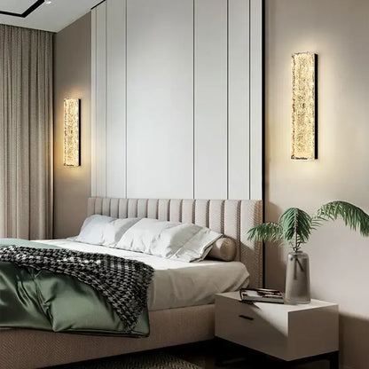 Modern gold and black led bedroom wall lamp with gold-toned rectangular wall sconce and textured crystalline surface