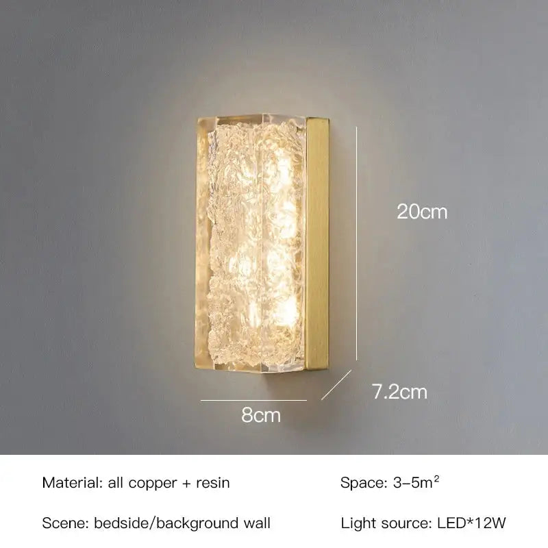Modern gold and black led bedroom wall lamp with gold-toned rectangular wall sconce, textured resin panel, and copper frame