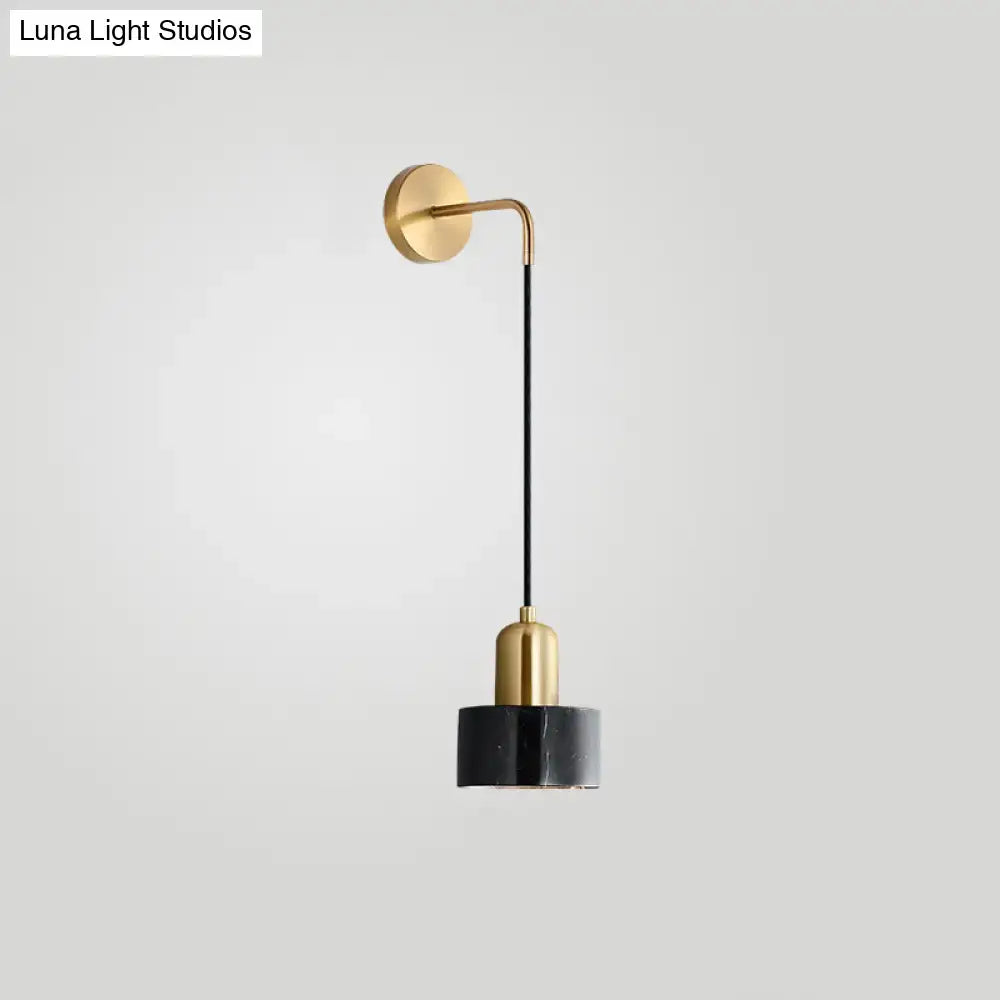 Modern gold and black marble pendant light fixture with a sleek gold wall sconce for living room maximum bulb wattage use