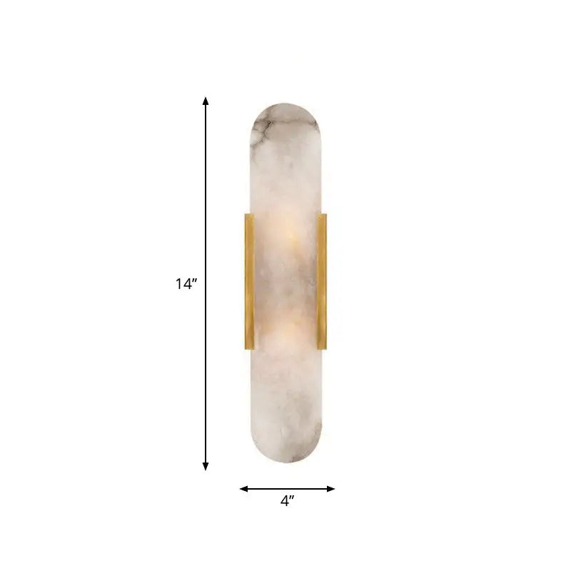 A sleek 14-inch tall wall sconce featuring a polished white marble shade with subtle gray veining, framed by two vertical brass bars.